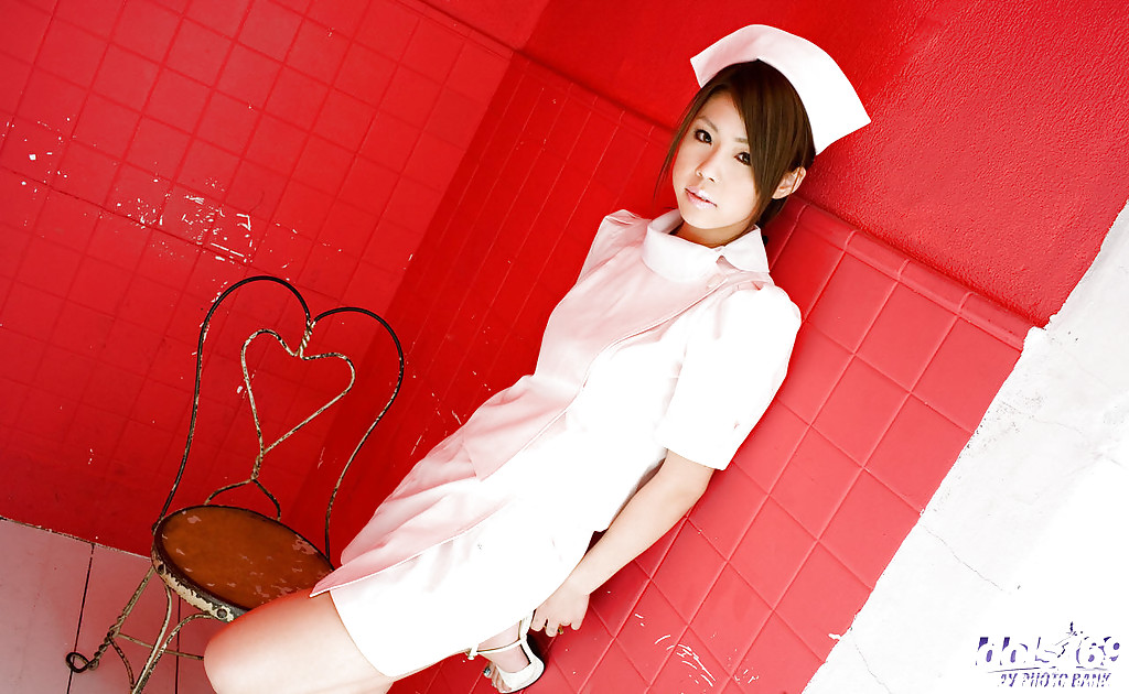 Busty asian nurse Haruka Sanada taking off her uniform and lacy panties