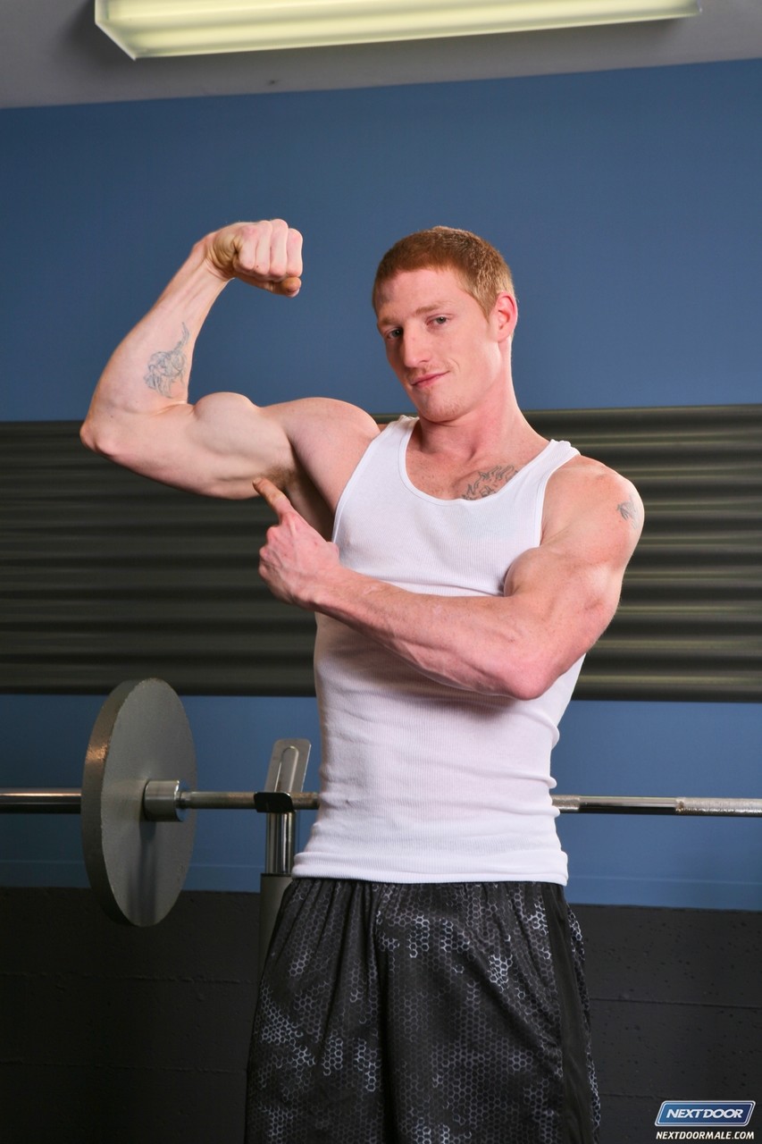 Inked ginger Max Thrust strips, shows his big dick and jerks off at the gym