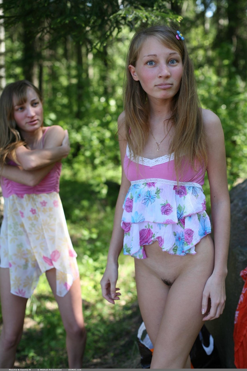 Blonde twins Sascha M & Mascha show their sweet teen tits outdoors  