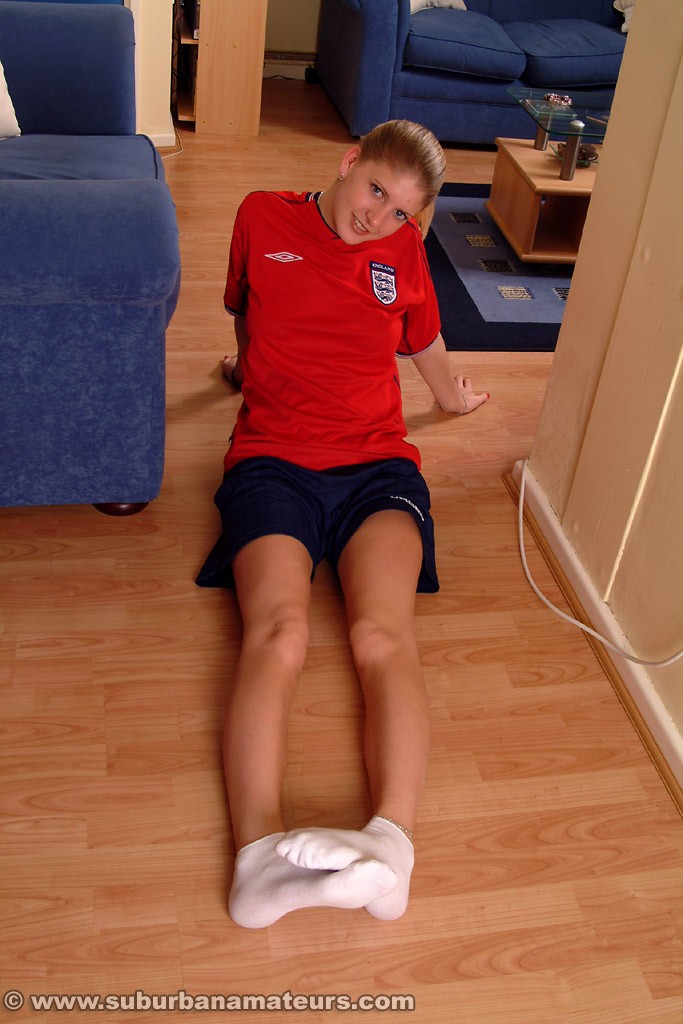 Soccer girl Kerry peels off her uniform & fingers her tight pussy up close