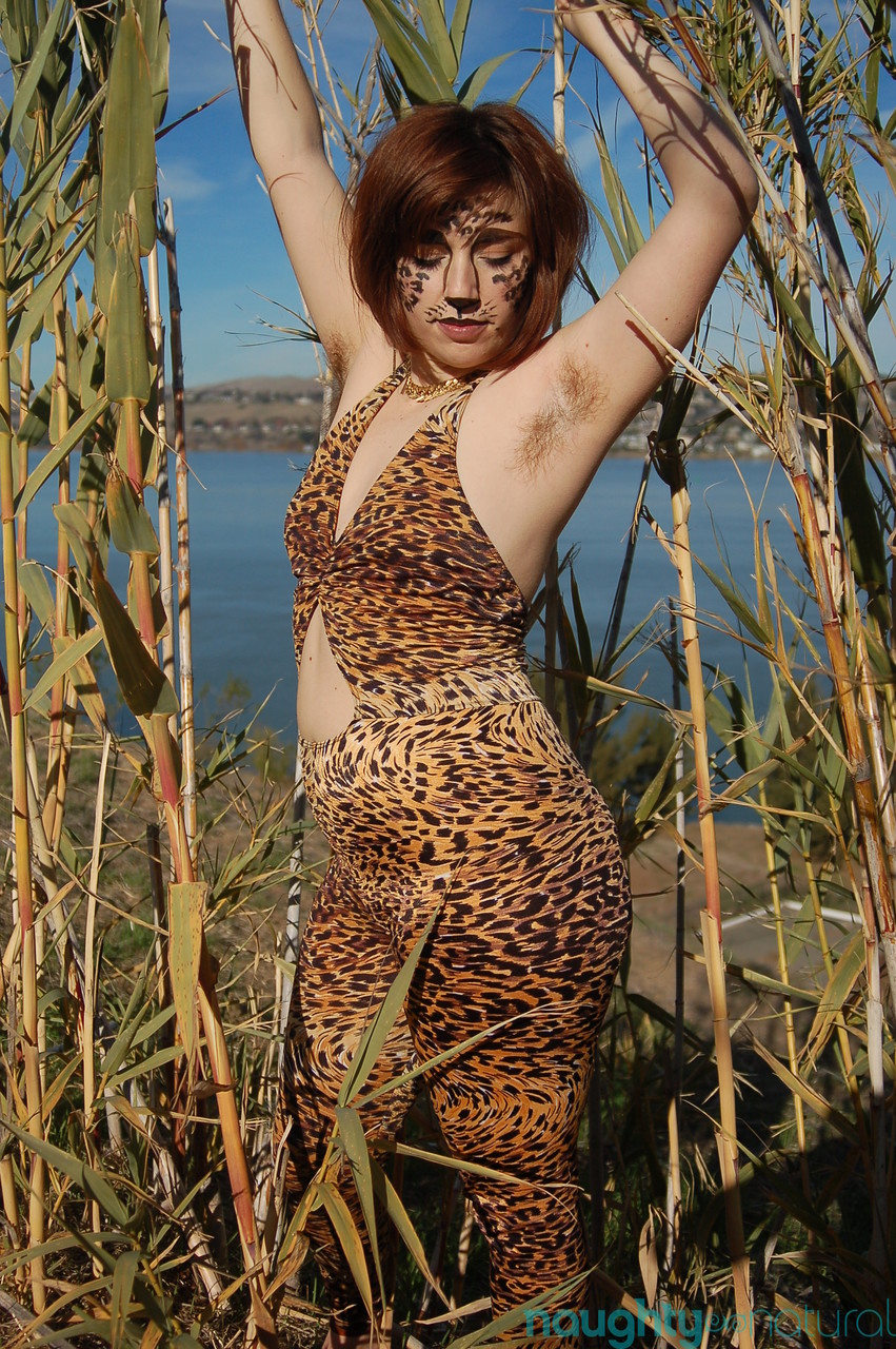 Chubby redhead Simone Delilah shows her hairy armpits & bushy clam outdoors  