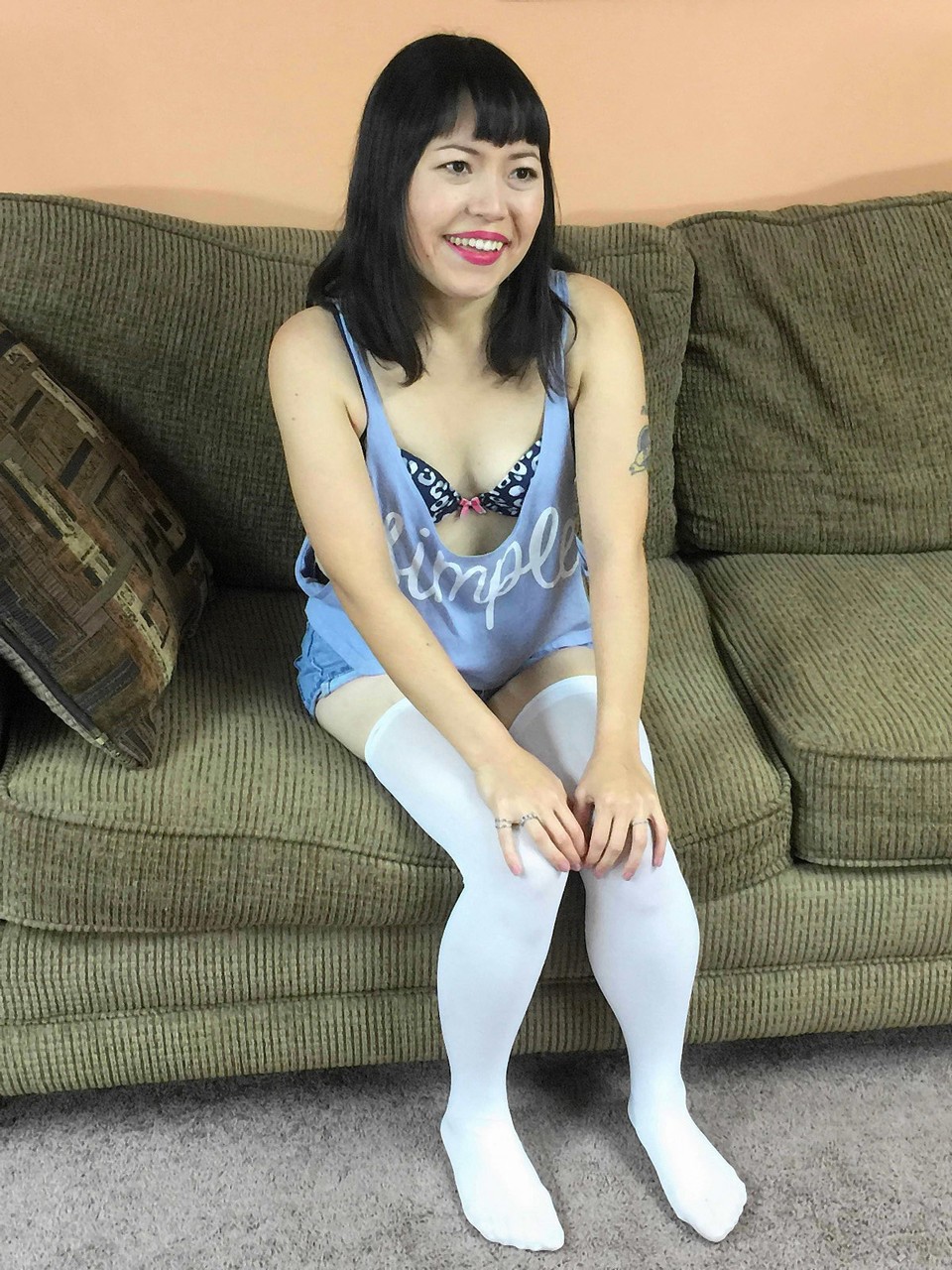 Asian babe Yuka Ozaki strips down to her stockings & gives a POV blowjob