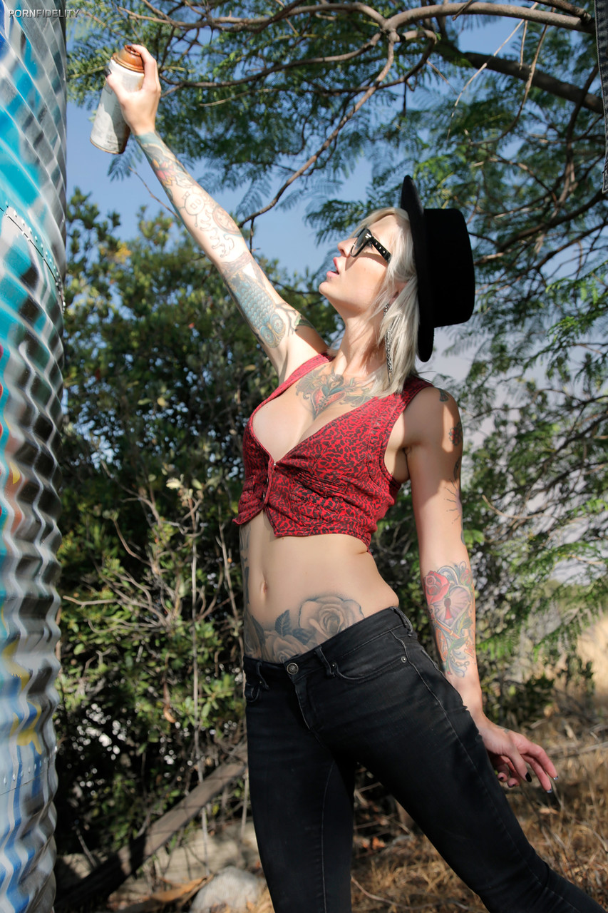 Tattooed graffiti artist Kleio Valentien gets her fake tits groped outdoors