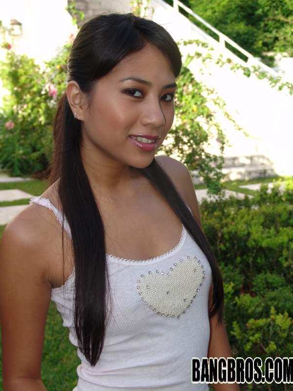 Lovely Asian chick Nyomi Marcela gives nice handjob and boobjob outdoors  
