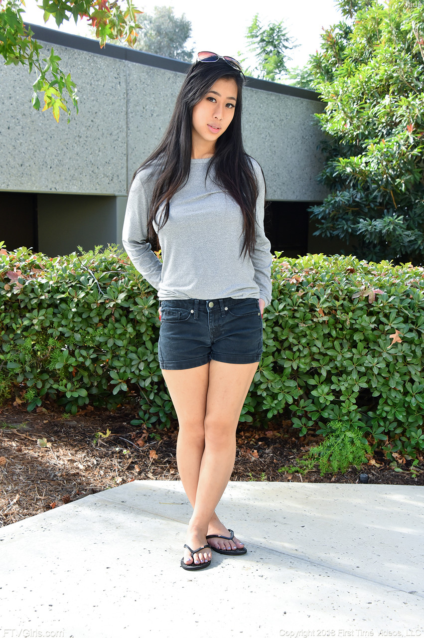 Beautiful Asian teen Jade Kush reveals her phenomenal boobs outdoors