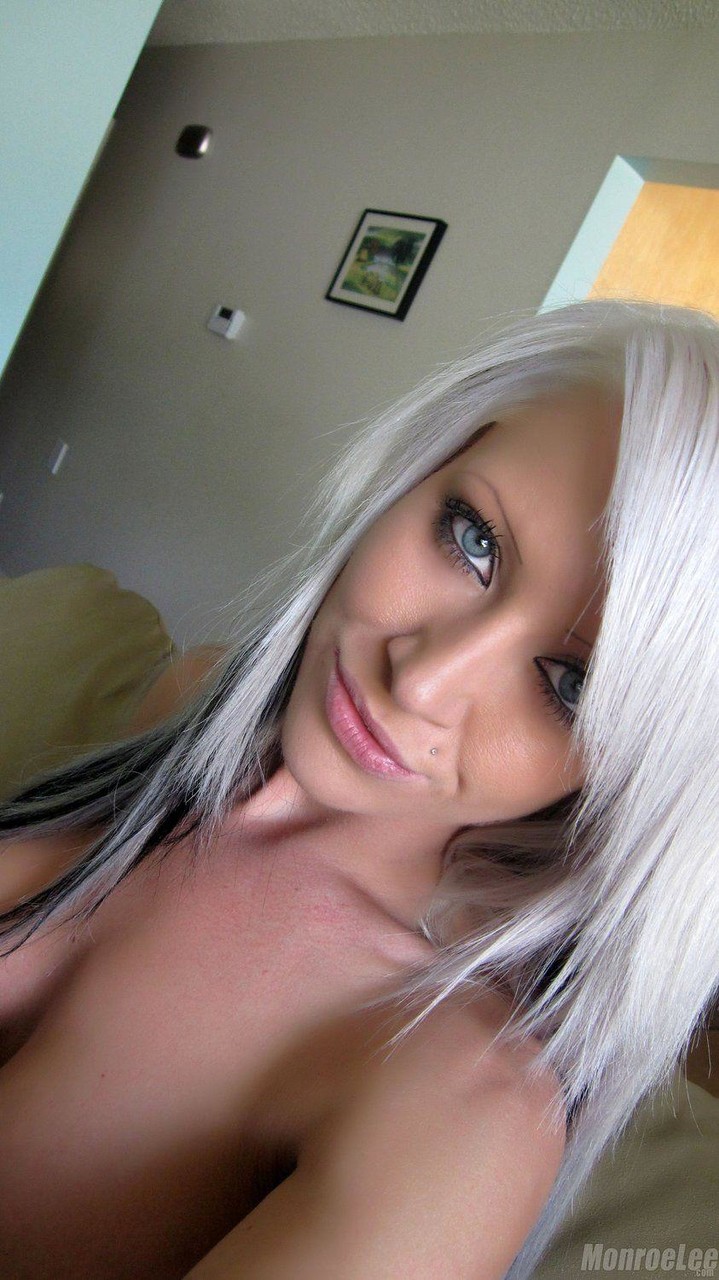 White haired slut Monroe Lee takes a selfie of her big tits and naked twat  