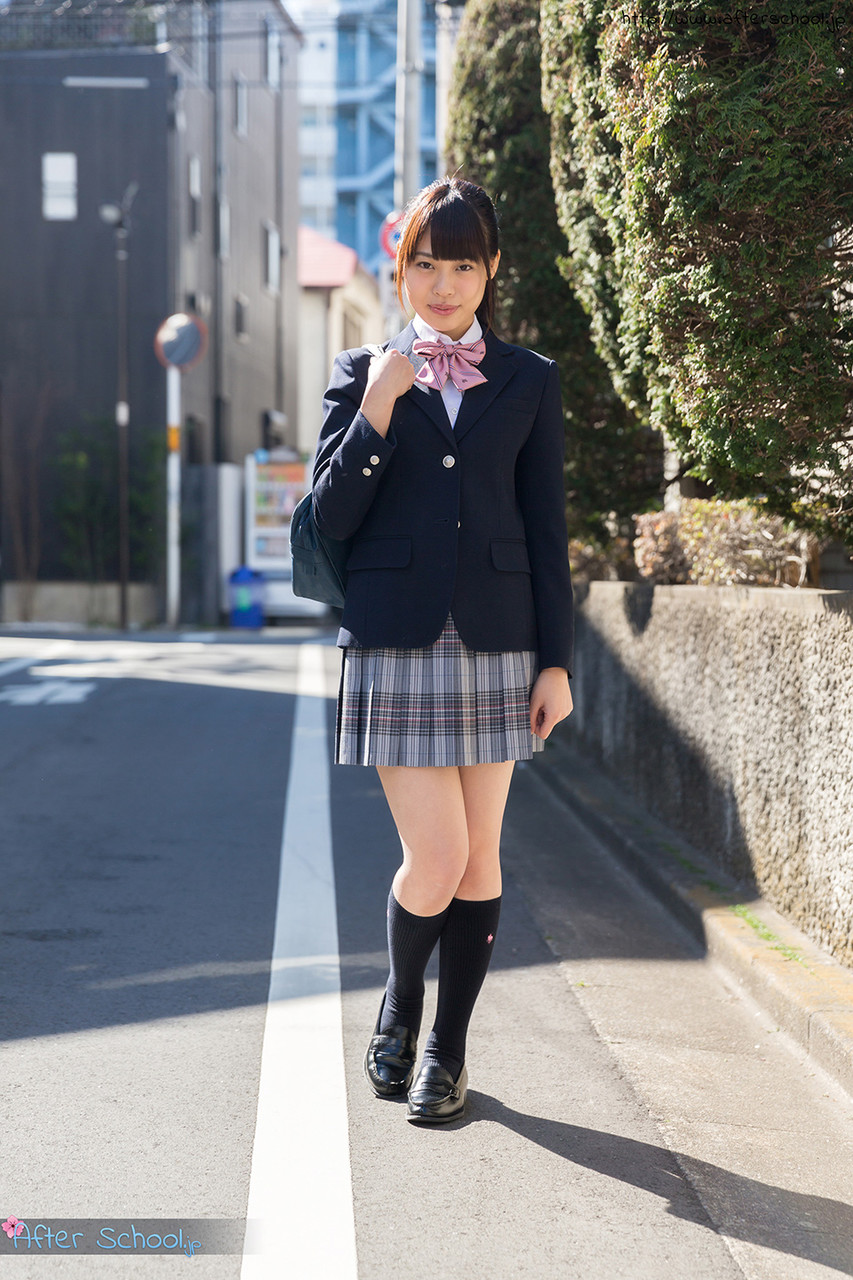 Japanese schoolgirl pulls down a cotton thong