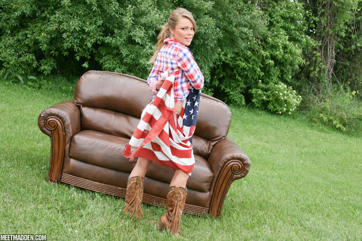 American chick Meet Madden strips to a thong and boots on a backyard couch