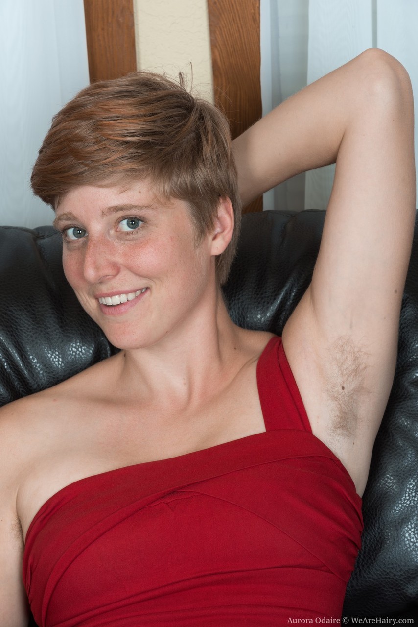 Short haired amateur Aurora Odaire proudly shows her unshaven pits and pussy