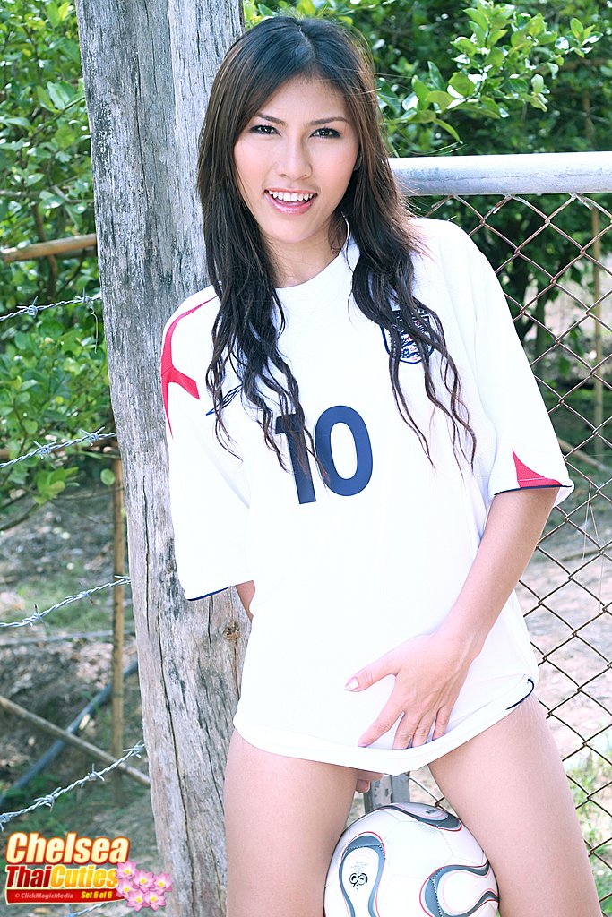 Nice Thai girl Chelsea holds a ball