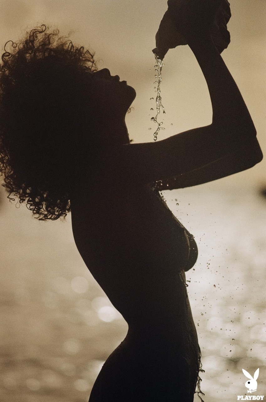 Ebony model Nereyda Bird strikes hot poses at the beach for Playboy
