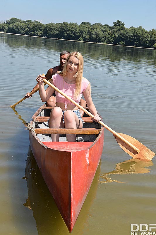 Young blonde and her guy friend canoe out to an island to fuck in nature  