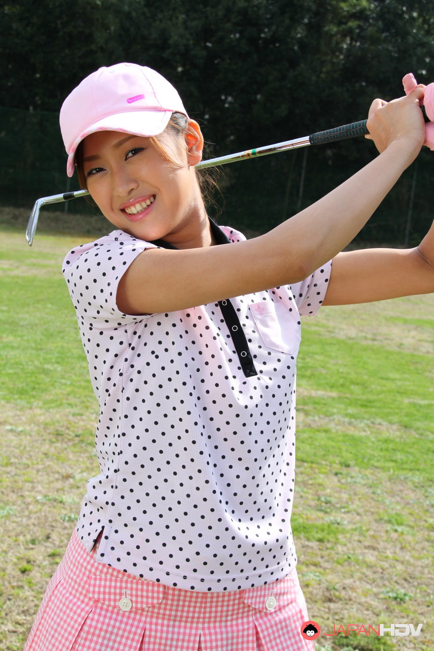 Young Japanese golfer Nao Yuzumiya flashes a no panty up skirt on the course  