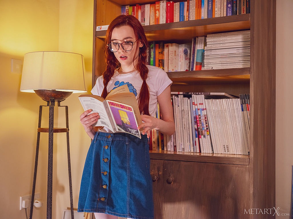 Young redhead Sherice keeps her glasses on