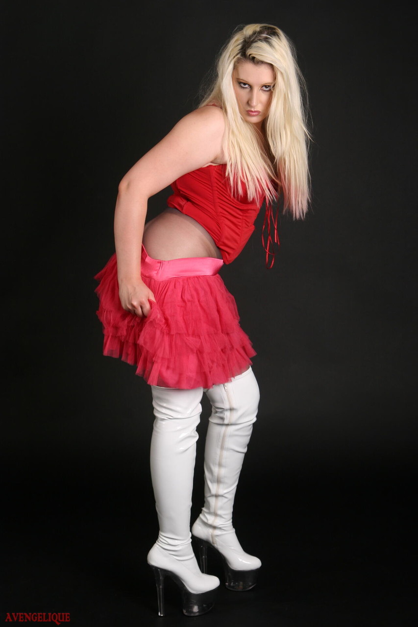 Blonde female Avengelique takes off her skirt