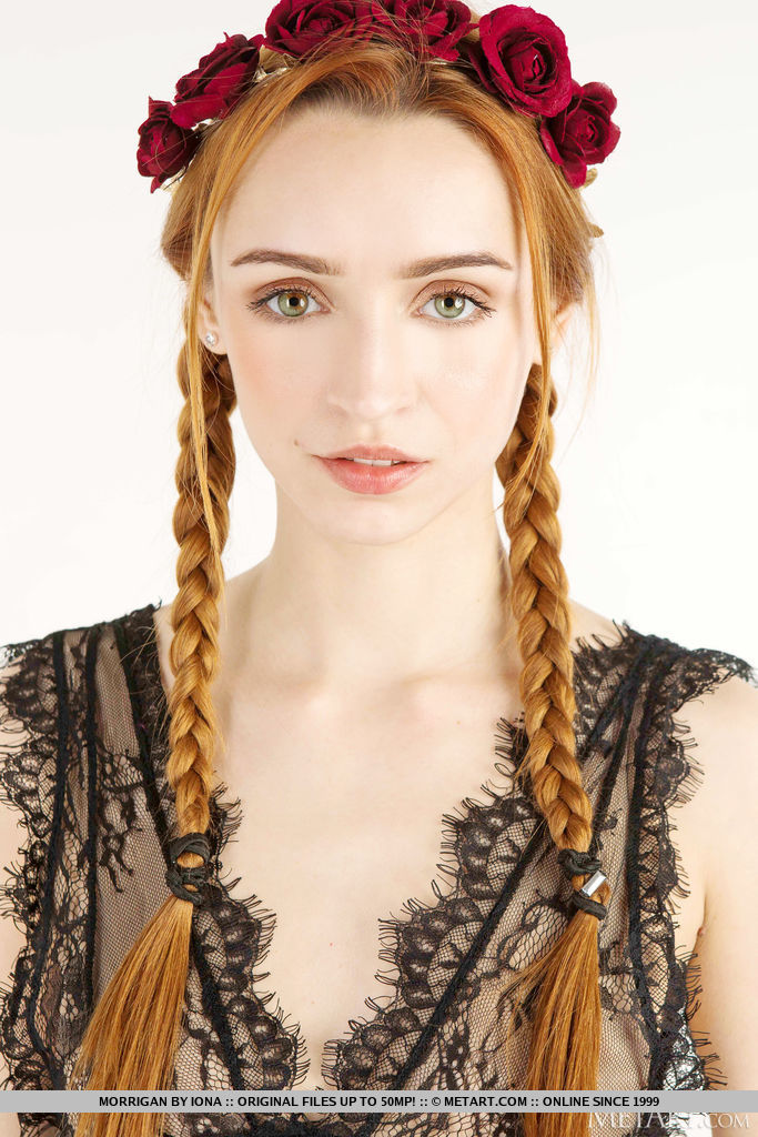 Beautiful redheaded teen Morrigan sports braided pigtails  