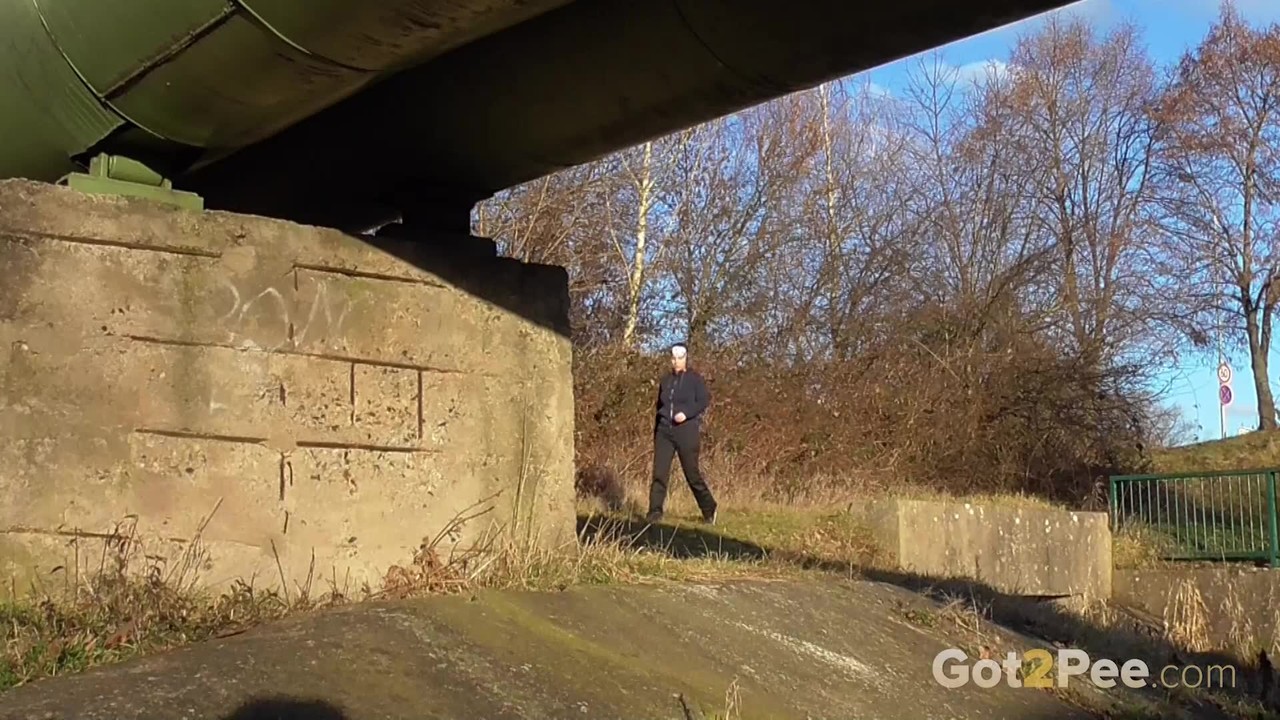 White girl Antonia Sainz pulls down her pants for a piss under an overpass