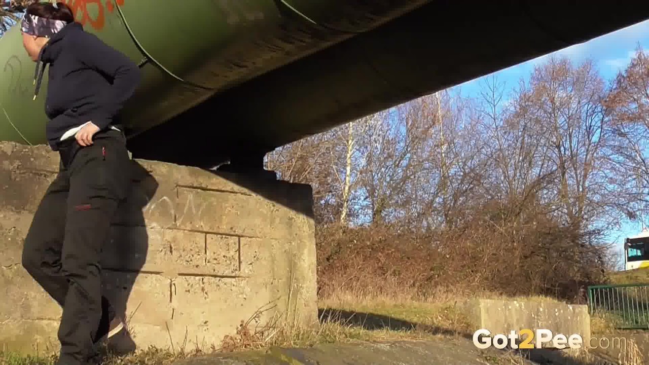 White girl Antonia Sainz pulls down her pants for a piss under an overpass  