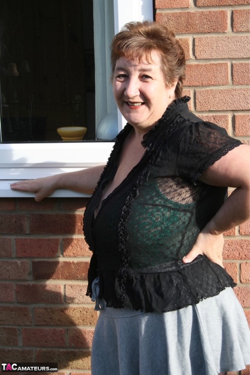 Older UK fatty Kinky Carol strips to lingerie and pantyhose outside her house