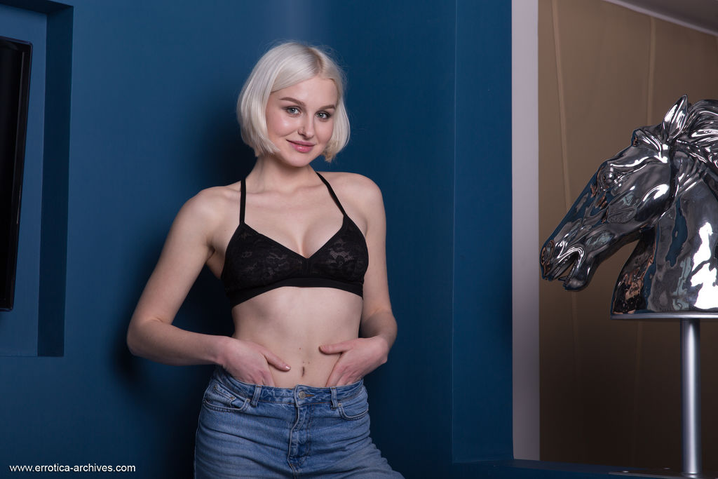 Platinum blonde teen Natalie P unveils her great body during solo action  