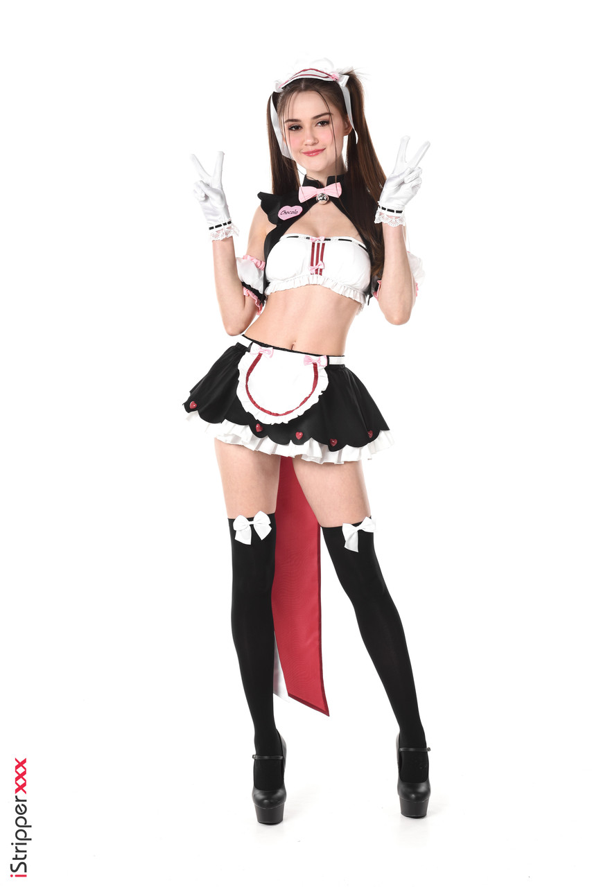 Cute girl Sonya Blaze models naughty maid apparel before dildoing her pussy