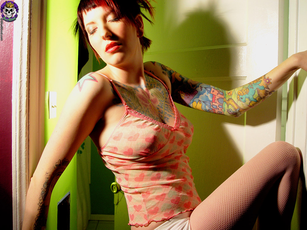 Busty Punk Chick In Panties Shows Her Tattoos  