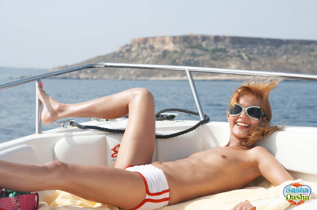 Two Amazing Nude Teens Posing On A Yacht