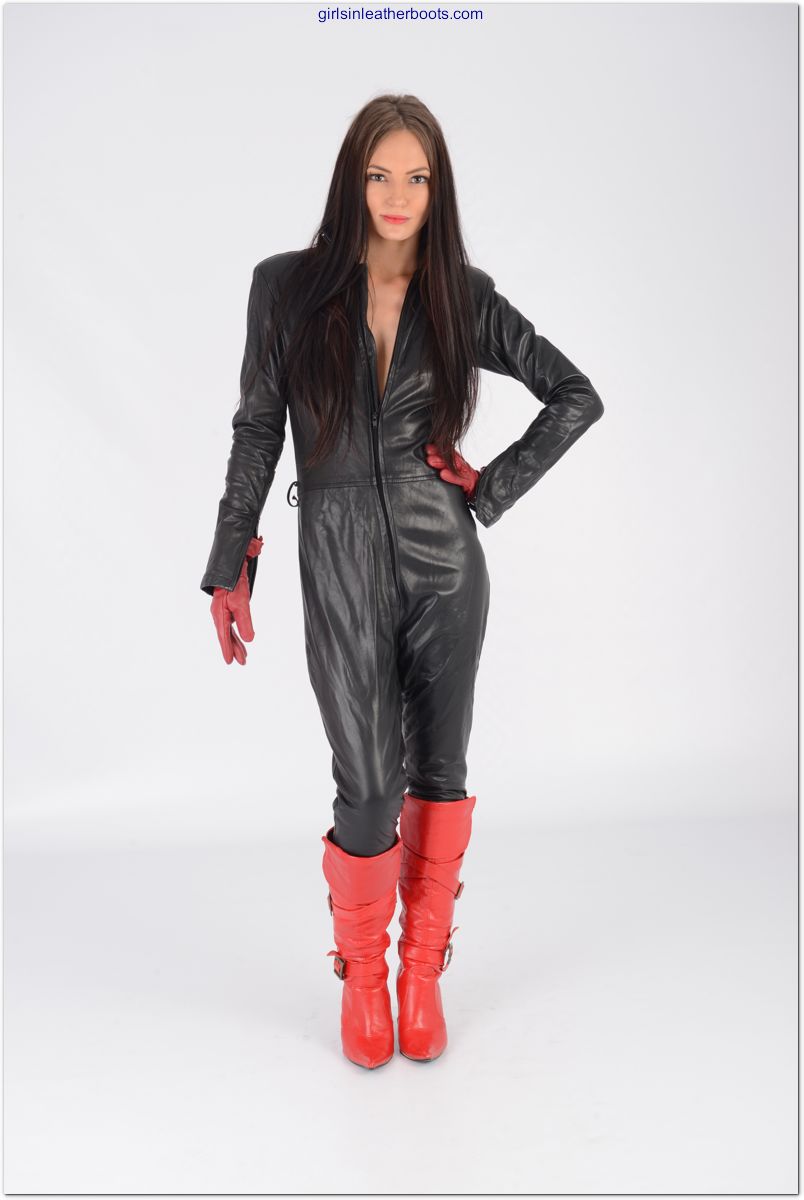 Gorgeous Femdom Cath Is Wearing A Tight Leather Catsuit And Naughty Red Leather Boots For