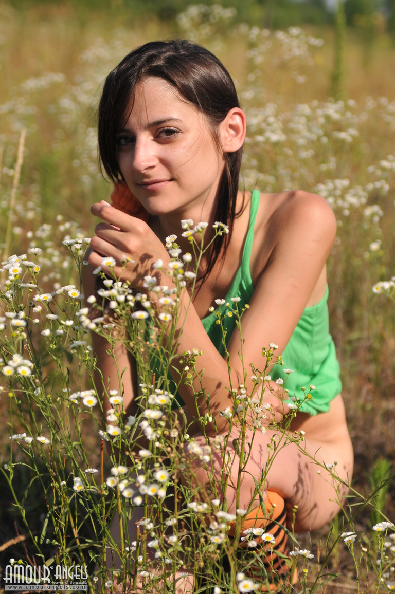 Marvelous Teen Girl In Striped Socks Undressing And Showing Slender Body On The Nature.  