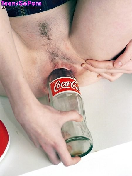 Ugly Skinny Girl Pushing A Cola Bottle In Her Twat  